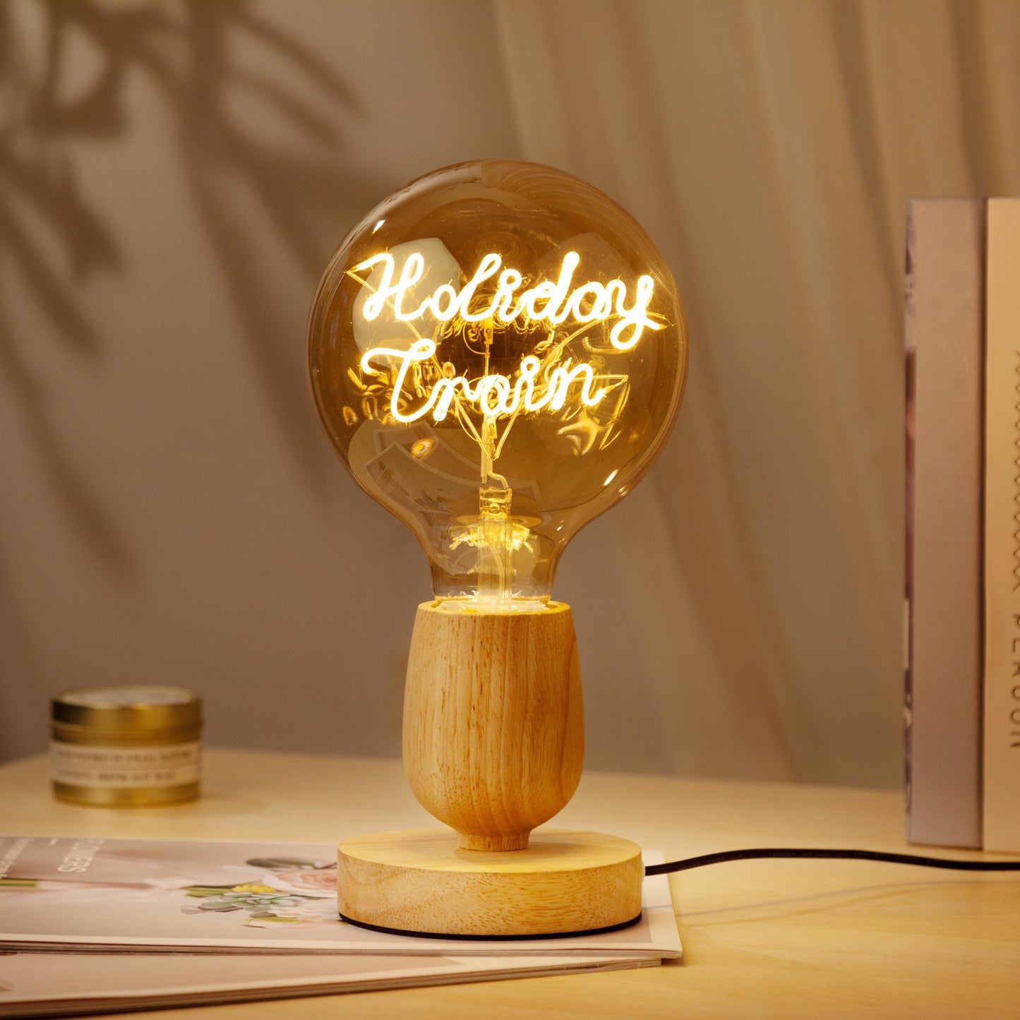 Personalized Edison bulb table lamp with a custom text filament and a bamboo wood base